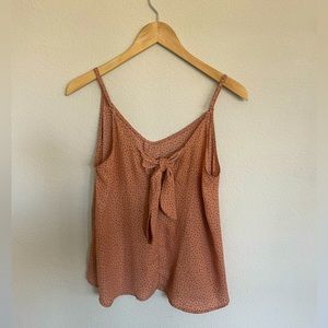Blush pleated textured silk-like top. Ties in the back, size S